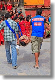 asia, boys, carrying, kathmandu, medics, men, nepal, pashupatinath, sick, vertical, photograph
