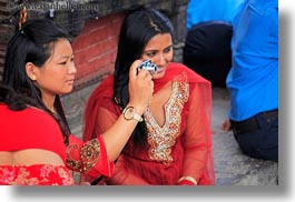 asia, emotions, friends, girls, horizontal, kathmandu, nepal, pashupatinath, people, photographing, smiles, teenagers, womens, photograph