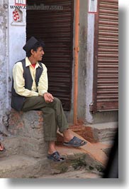 asia, kathmandu, men, nepal, patan darbur square, sitting, vertical, photograph