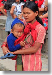 asia, babies, earrings, hindu, jewelry, kathmandu, mothers, nepal, patan darbur square, religious, sindoor, stud, tikka, vertical, womens, photograph