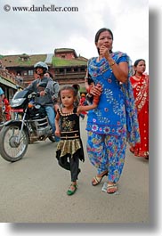 asia, bindi, daughter, earrings, hindu, jewelry, kathmandu, mothers, nepal, nose ring, patan darbur square, religious, sindoor, tikka, vertical, womens, photograph