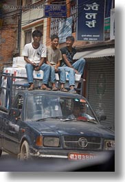 asia, boys, kathmandu, nepal, streets, trucks, vertical, photograph
