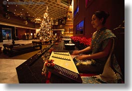 asia, bangkok, horizontal, hotels, music, people, playing, thailand, womens, photograph