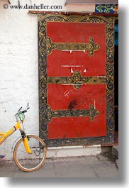 asia, asian, bicycles, colors, doors, lhasa, red, style, tibet, vertical, photograph