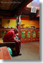 alone, asia, buddhist, lhasa, men, monks, people, religious, rooms, sitting, tibet, vertical, photograph