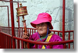 asia, buddhist, horizontal, lhasa, old, people, poles, prayers, religious, tibet, womens, photograph