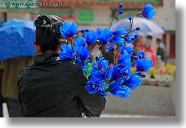 asia, blues, carrying, flowers, horizontal, lhasa, people, tibet, womens, photograph
