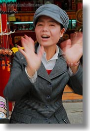 asia, hands, lhasa, people, tibet, vertical, waving, womens, photograph