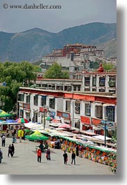 asia, lhasa, palace, people, potala, shops, streets, tibet, vertical, photograph