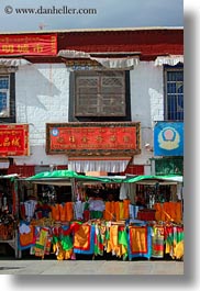 asia, fabrics, lhasa, sales, stands, streets, tibet, vertical, photograph