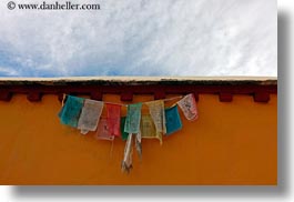 asia, asian, buddhist symbols, clouds, flags, horizontal, nature, prayers, sky, style, tan druk temple, tibet, walls, photograph