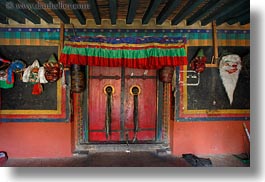 asia, asian, doors, horizontal, masks, ornate, style, tan druk temple, tibet, photograph