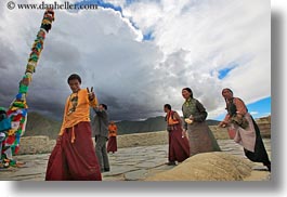 asia, asian, emotions, flags, horizontal, people, poles, prayers, smiles, tibet, walking, yumbulagang, photograph