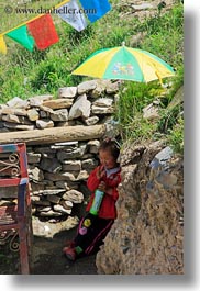 asia, asian, girls, people, tibet, toddlers, umbrellas, under, vertical, yumbulagang, photograph