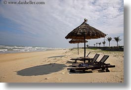 asia, beaches, conical, danang, horizontal, straws, umbrellas, vietnam, photograph