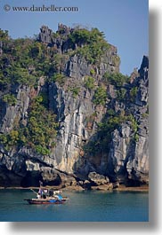 asia, boats, cliffs, ha long bay, mountains, nature, small, small boats, vertical, vietnam, photograph