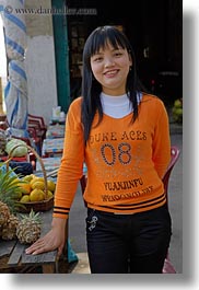 asia, asian, girls, ha long bay, oranges, people, sweater, vertical, vietnam, photograph
