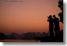 asia, colors, ha long bay, horizontal, mountains, nature, oranges, photographers, silhouettes, sky, sun, sunsets, vietnam, photograph