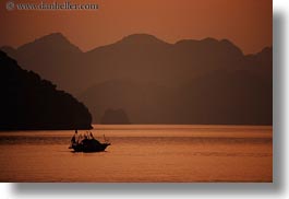asia, boats, colors, ha long bay, horizontal, mountains, nature, oranges, sky, small, sun, sunsets, vietnam, photograph