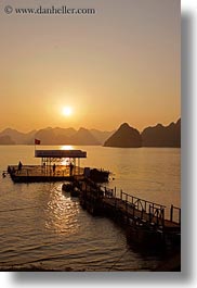 asia, colors, dock, ha long bay, mountains, nature, sky, sun, sunsets, vertical, vietnam, yellow, photograph