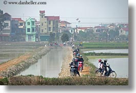 asia, bikes, crowds, driving, hanoi, horizontal, motorcycles, vietnam, water, photograph