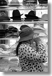 asia, black and white, hanoi, hats, shops, vertical, vietnam, womens, photograph