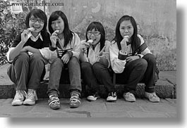 asia, black and white, girs, hanoi, horizontal, ice cream, people, teenage, vietnam, womens, photograph