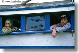 asia, boats, hoi an, horizontal, looking, men, out, vietnam, windows, photograph