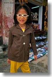 asia, childrens, girls, glasses, hoi an, humor, laughing, people, vertical, vietnam, photograph