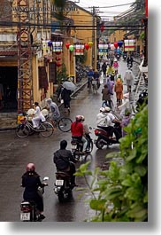 asia, hoi an, motorcycles, rainy, streets, vertical, vietnam, photograph