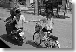 asia, bikes, black and white, girls, hands, holding, horizontal, hue, motorcycles, vietnam, photograph