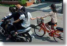 asia, bikes, girls, hands, holding, horizontal, hue, motorcycles, vietnam, photograph