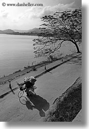 asia, bicycles, bikes, conical, hats, hue, vertical, vietnam, womens, photograph