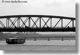 asia, black and white, boats, bridge, ferry, going, horizontal, hue, under, vietnam, photograph