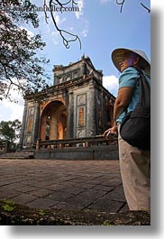 asia, clothes, conical, hats, hue, khai dinh, pavilion, stele, tourists, tu duc tomb, vertical, vietnam, womens, photograph