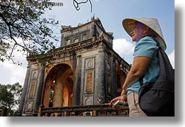 asia, clothes, conical, hats, horizontal, hue, khai dinh, pavilion, stele, tourists, tu duc tomb, vietnam, womens, photograph