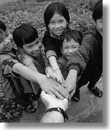 asia, asian, black and white, childrens, emotions, hands, people, smiles, touching, vertical, vietnam, villages, photograph