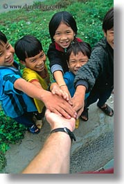 asia, asian, childrens, downview, emotions, groups, people, perspective, smiles, vertical, vietnam, villages, photograph