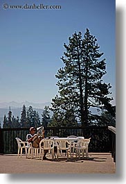 california, kings canyon, men, newspaper, reading, tables, vertical, west coast, western usa, photograph