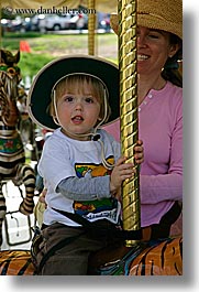 amusement park ride, boys, california, childrens, hats, jacks, merry go round, oakland zoo, toddlers, vertical, west coast, western usa, photograph