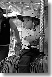 amusement park ride, black and white, boys, california, childrens, hats, jacks, merry go round, oakland zoo, toddlers, vertical, west coast, western usa, photograph