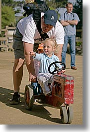california, childrens zoo, girls, san francisco, toddlers, tractor, vertical, west coast, western usa, zoo, photograph