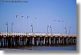 california, coastline, flags, horizontal, lamp posts, nature, ocean, piers, santa cruz, structures, water, west coast, western usa, photograph