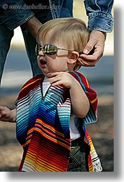 babies, boys, california, clothes, colorful, emotions, happy, jacks, people, poncho, sunglasses, toddlers, vertical, west coast, western usa, yosemite, photograph