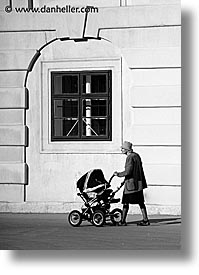 austria, black and white, buildings, europe, old, people, vertical, vienna, womens, photograph