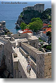 city wall, croatia, dubrovnik, europe, fortress, ocean, rooftops, stones, vertical, walk, walls, photograph