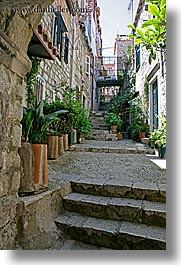 alleys, croatia, dubrovnik, europe, lined, narrow streets, plants, vertical, photograph