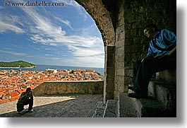 archways, cityscapes, croatia, dubrovnik, europe, horizontal, men, photographers, photographing, town view, photograph