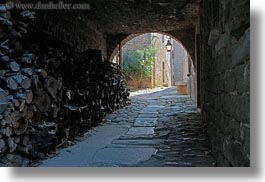 arches, archways, cobblestones, croatia, europe, groznjan, horizontal, materials, narrow streets, roads, stones, streets, structures, photograph