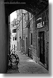 arches, archways, bicycles, black and white, croatia, europe, korcula, under, vertical, photograph